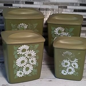 Vintage 1970s green daisy canister set